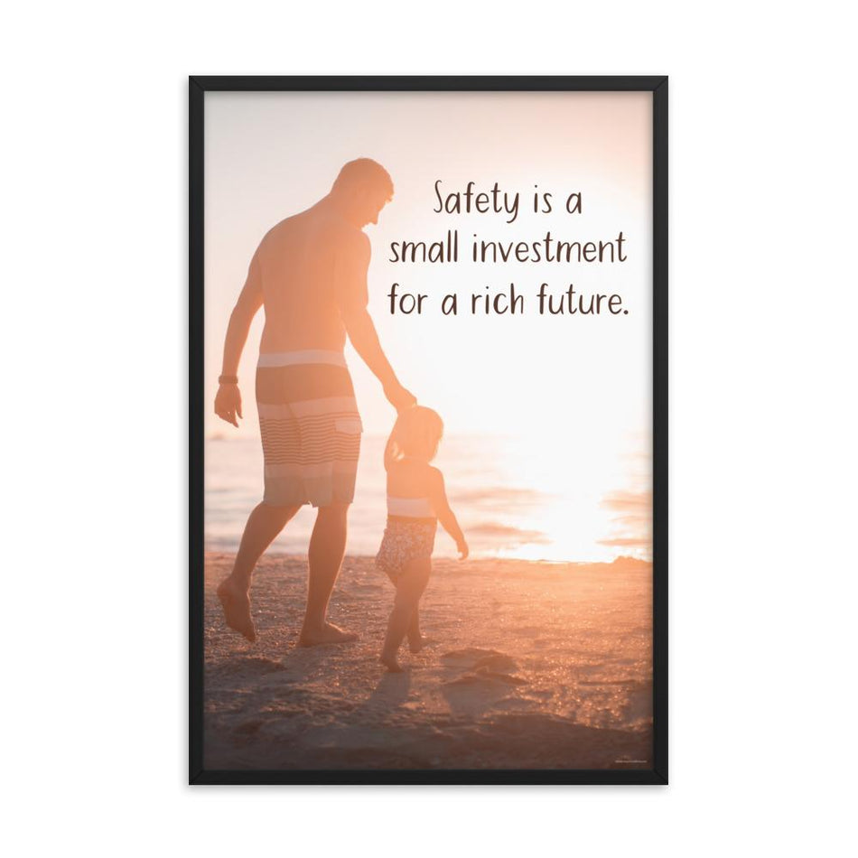 A workplace safety poster showing a father and his young daughter walking on the shore of a beach with a beautiful sunset in the background and text saying safety is a small investment for a rich future.