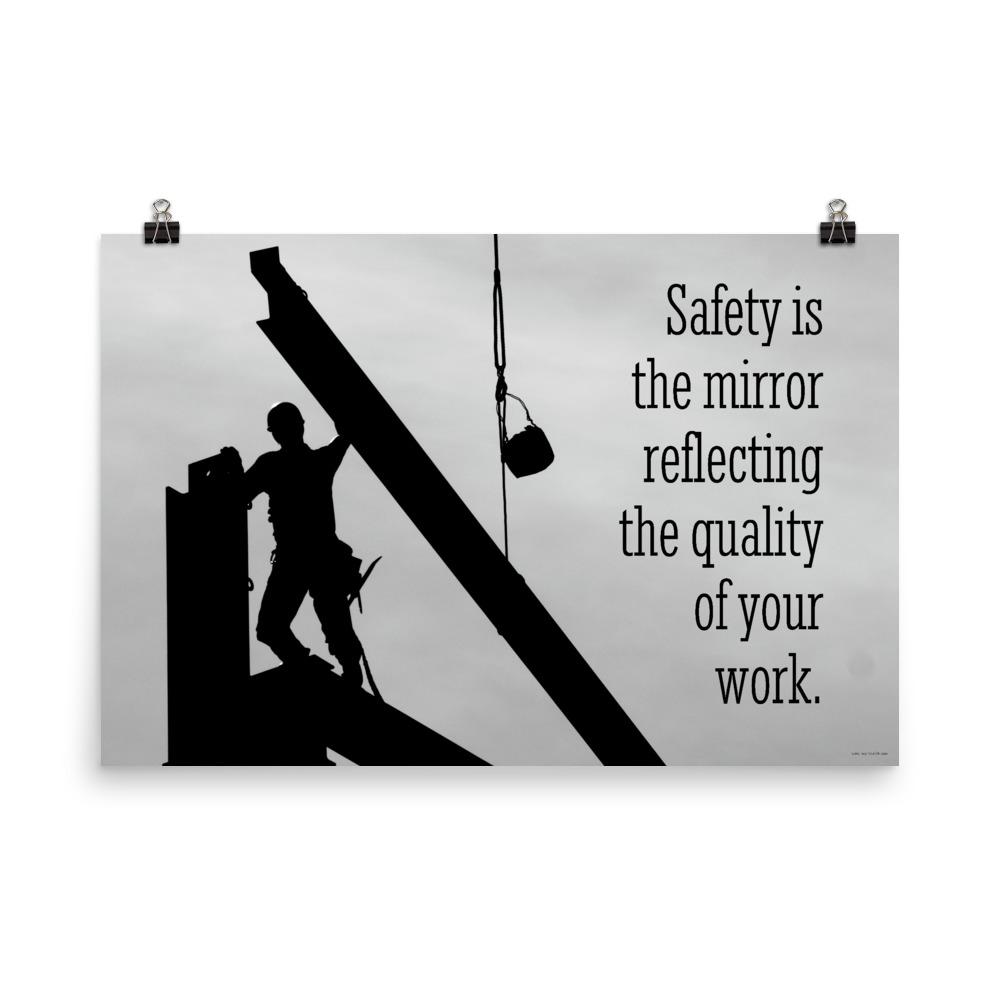 A workplace safety poster showing a construction ironworker working on a construction site with everything silhouetted black with a light grey background and with the slogan safety is the mirror reflecting the quality of your work.