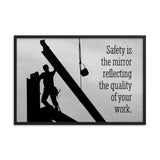 A workplace safety poster showing a construction ironworker working on a construction site with everything silhouetted black with a light grey background and with the slogan safety is the mirror reflecting the quality of your work.