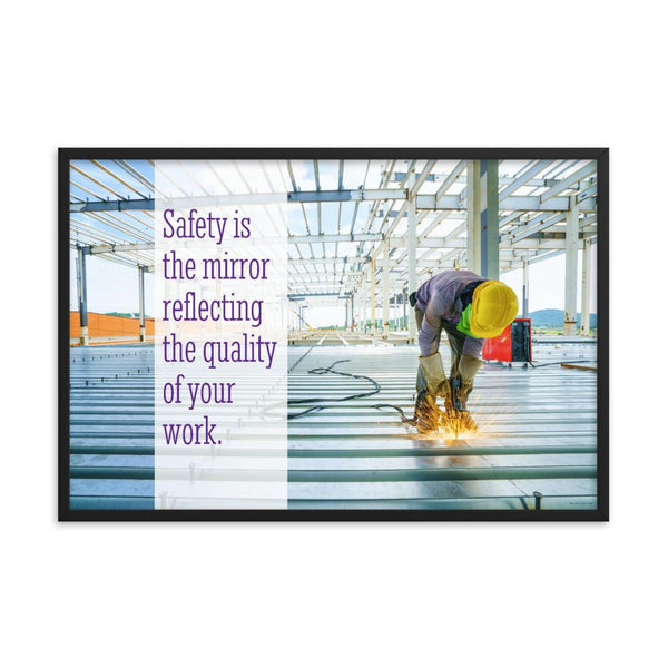 A workplace safety poster showing a construction worker wearing all of the proper PPE and bending over to work on a huge sheet of metal with sparks flying everywhere with the slogan safety is the mirror reflecting the quality of your work.