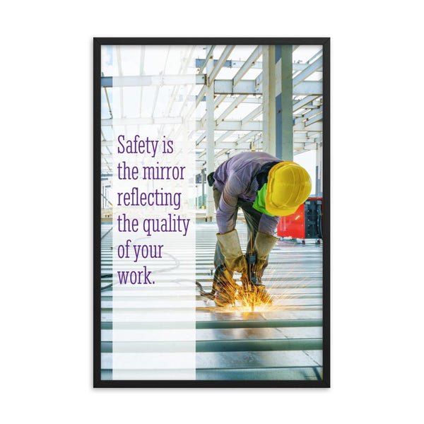 A workplace safety poster showing a construction worker wearing all of the proper PPE and bending over to work on a huge sheet of metal with sparks flying everywhere with the slogan safety is the mirror reflecting the quality of your work.
