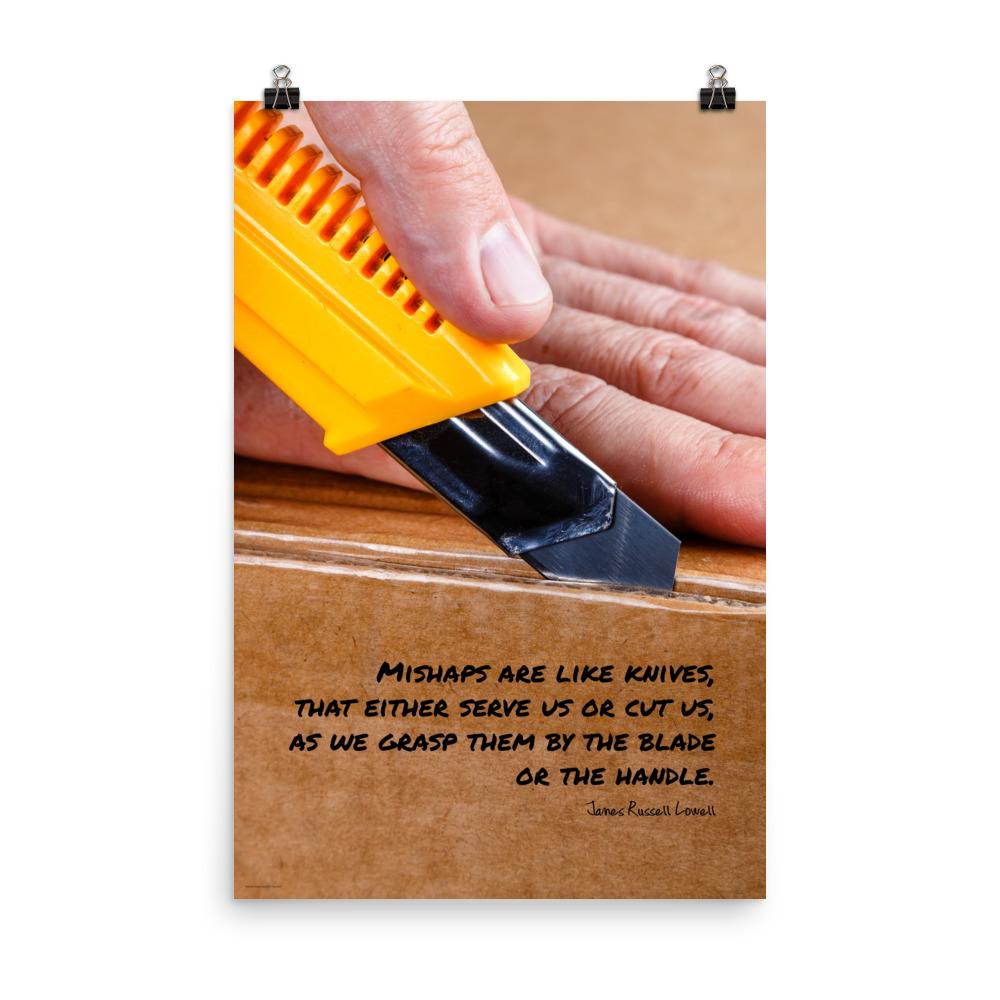 A workplace safety poster showing a close-up of hands opening a box using a boxcutter with a safety quote below the hands.