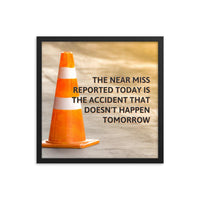 A workplace safety poster showing an orange safety cone with the slogan the near miss reported today is the accident that doesn't happen tomorrow.