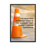 A workplace safety poster showing an orange safety cone with the slogan the near miss reported today is the accident that doesn't happen tomorrow.