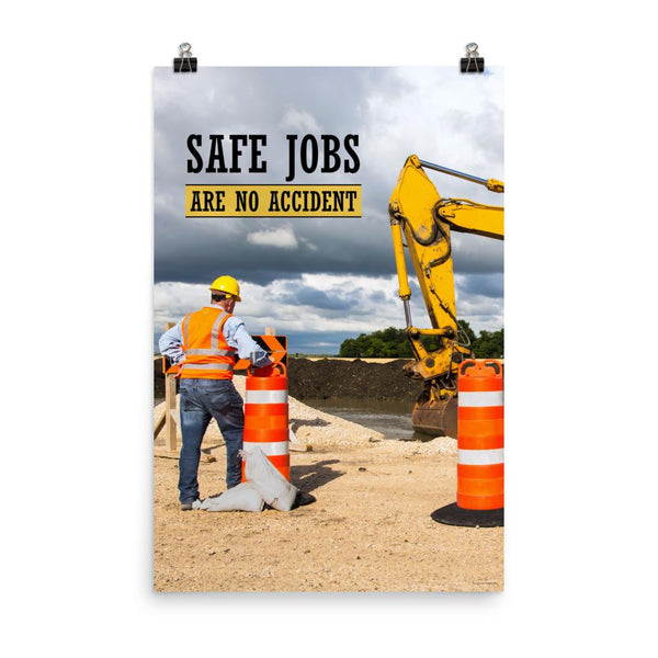 A safety poster showing a construction worker on a worksite outside with a big excavator in the background and the slogan safe jobs are no accident against the bright blue sky.