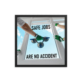 A workplace safety poster showing a close-up of two worker's hands wearing gloves while installing windows with the slogan safe jobs are no accident.
