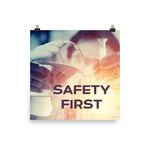 A safety poster showing a close-up of multiple gloved hands in a laboratory pouring substances into a beaker with the slogan safety first in the foreground.