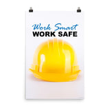 A safety poster showing a close-up of a yellow hard hat on a white background with the slogan work smart and work safe.