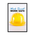 A safety poster showing a close-up of a yellow hard hat on a white background with the slogan work smart and work safe.