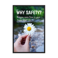 A workplace safety poster showing a close up of a hand holding a bright white daisy in the forest with the slogan why safety? to enjoy more time in your happy place.