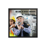 A workplace safety poster showing two workers in hardhats, reflective vests, and safety glasses collaborating together in a factory with the quote no one is wise enough by themselves by Plautus.