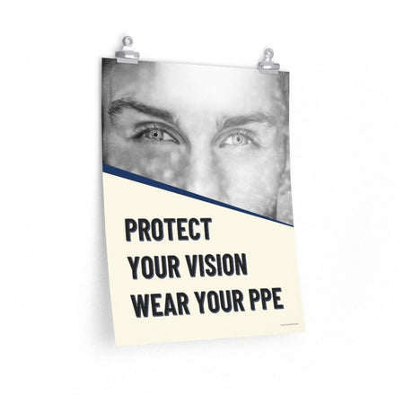 A safety poster with a black and white image of a man's eyes with a slash of blue underneath with bold text that says "protect your vision, wear your ppe."