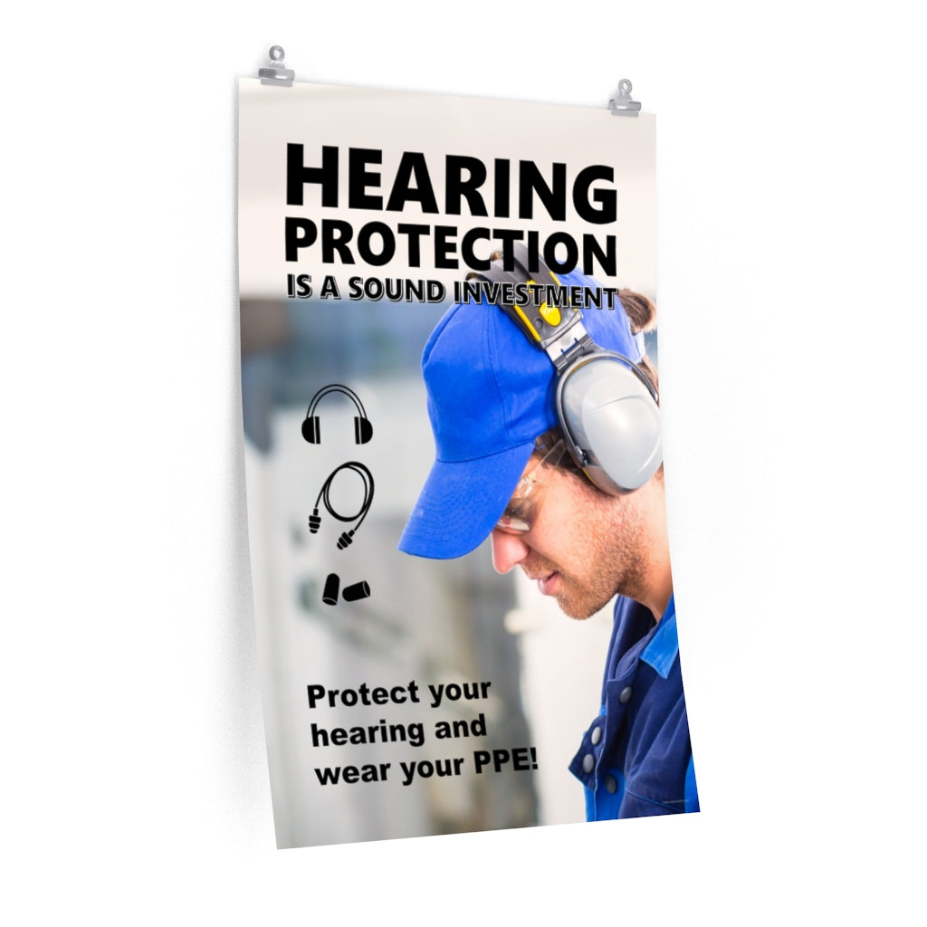 An ear safety poster showing a close up of a man's profile wearing ear muffs and safety glasses with a safety slogan and infographics of hearing PPE all around him.