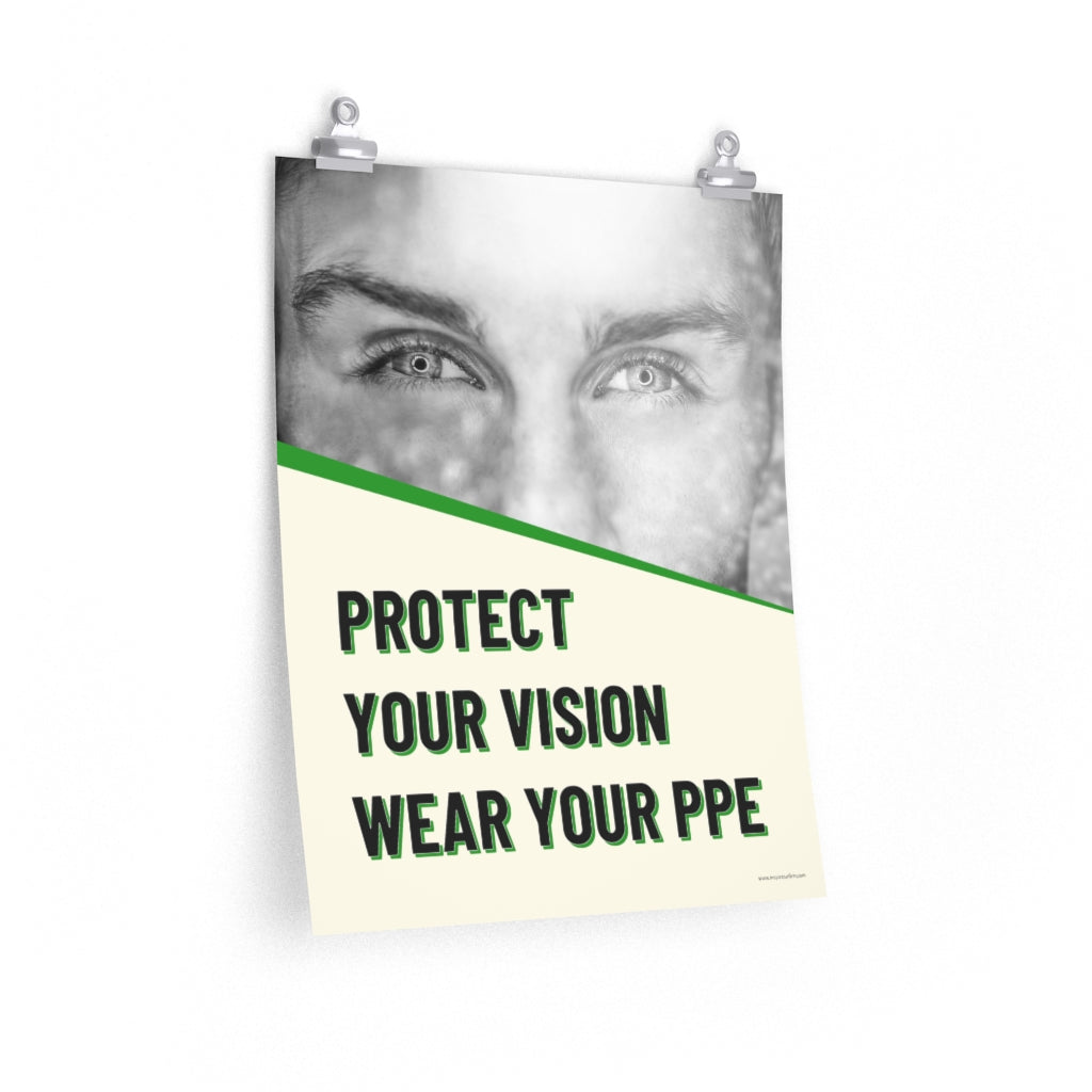 An eye safety poster of a black and white close up of a man's eyes looking intently forward with a safety slogan in green text below.