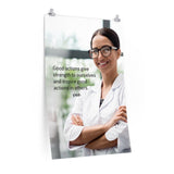Safety poster showing a woman in a white lab coat and glasses smiling with arms crossed in a laboratory and a safety quote written to the left.