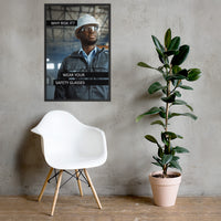 An eye safety poster showing a man in a white hard hat and safety glasses in a warehouse with the slogan "Why risk it? Wear your safety glasses."