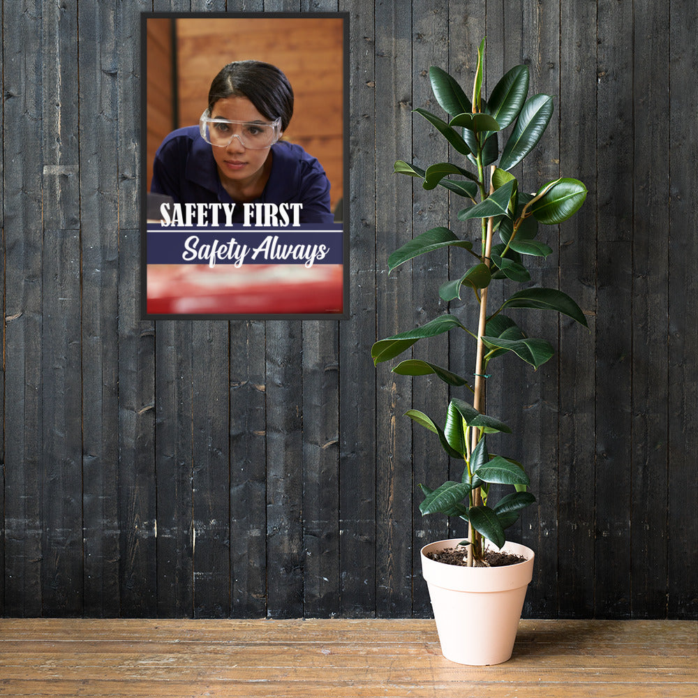 A safety poster showing a woman in safety glasses working in a woodshop with the slogan "Safety first, safety always" below her.