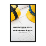 A safety poster showing a yellow hard hat and yellow ear muffs on blueprints with a safety quote by Johann Wolfgang von Goethe that says "Knowing is not enough, we must apply. Willing is not enough, we must do."