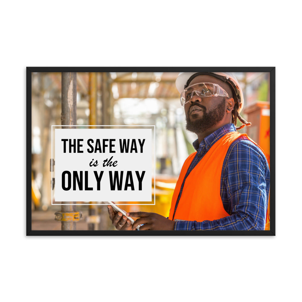 A construction worker in an orange vest, hard hat, and safety glasses working intently with the slogan "The safe way is the only way."