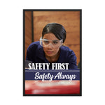 A safety poster showing a woman in safety glasses working in a woodshop with the slogan "Safety first, safety always" below her.