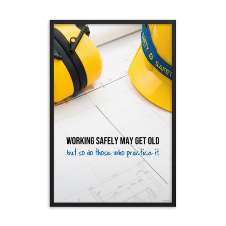A construction safety poster showing yellow ear muffs and a hard hat resting on blueprints with the slogan "Working safely may get old, but so do those who practice it."