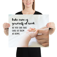 A safety poster showing a close-up of a baby's tiny hand wrapped around their parent's finger with the slogan take care of yourself at work so you can take care of them at home.