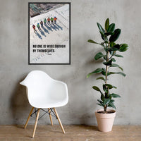 A workplace safety poster showing an aerial view of construction workers in reflective vests standing in a line on top of a building with their shadows being cast on the building with the quote no one is wise enough by themselves by Plautus.