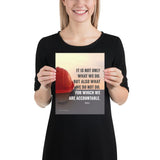 Safety poster showing a bright red hard hat sitting on concrete with sunny sky in background and a safety quote written in bold letters.
