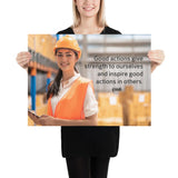 Safety poster showing a female warehouse worker smiling and wearing an orange reflective safety vest and orange hard hat with a safety quote written in dark text.