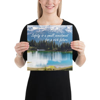 A workplace safety poster depicting a beautiful pond in the foreground, lush evergreens in the middle ground and snow-capped mountains in the background with text saying safety is a small investment for a rich future.