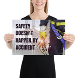 Safety poster that shows a construction worker wearing fall protection equipment with bridge in the background and a safety slogan in bold letters.