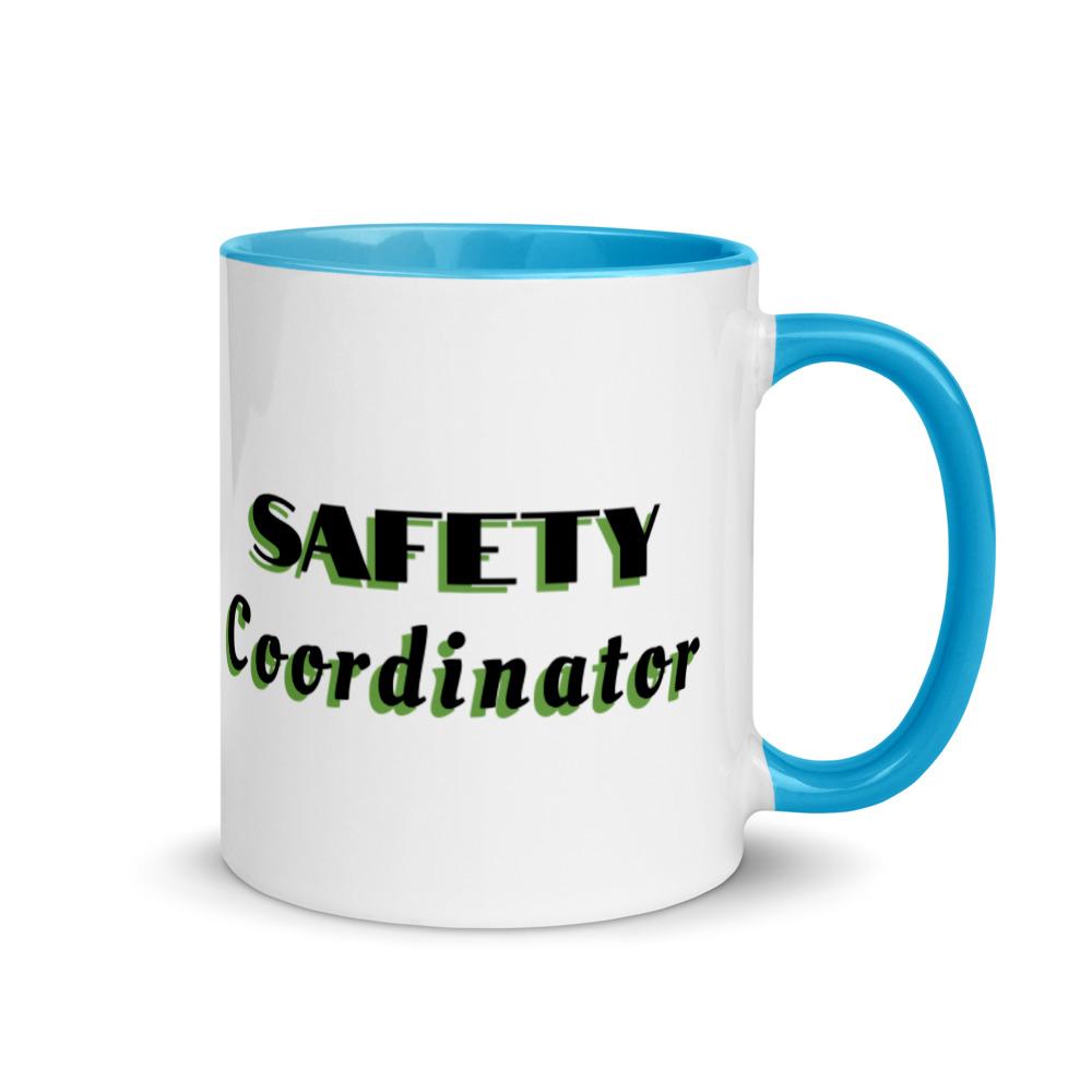 White ceramic mug with "Safety Coordinator" in bold text across the side, with blue color on the inside, the rim, and the handle.