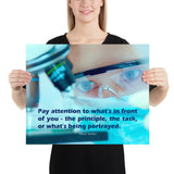 Workplace safety poster of a close up of a woman's eyes wearing safety glasses inspecting a sample on a microscope with safety quote written at the bottom.