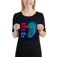 An ear safety poster depicting a geometric illustration of a glowing ear with a glowing red point inside the ear, as if it's been damaged, with a safety slogan to the left.