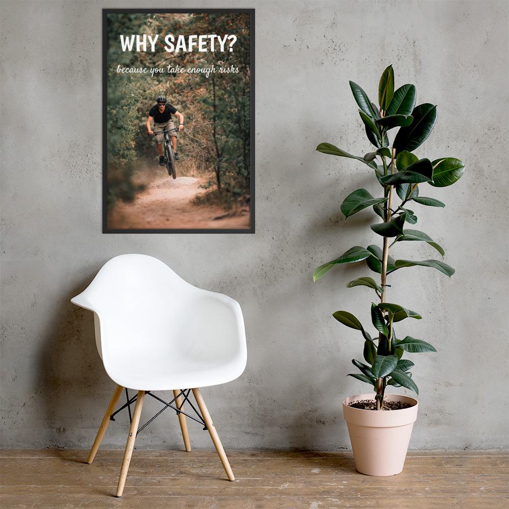 A workplace safety poster showing a man dirt biking on a forest trail with the slogan why safety? because you take enough risks.