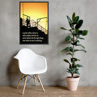 A construction safety poster showing the silhouette of a construction worker working on a building with a bright yellow sunset in the background and a safety slogan in the bottom left corner.