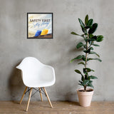 A workplace safety poster showing a white, a yellow, and a blue hardhat sitting on a wall with the slogan safety first, safety always.