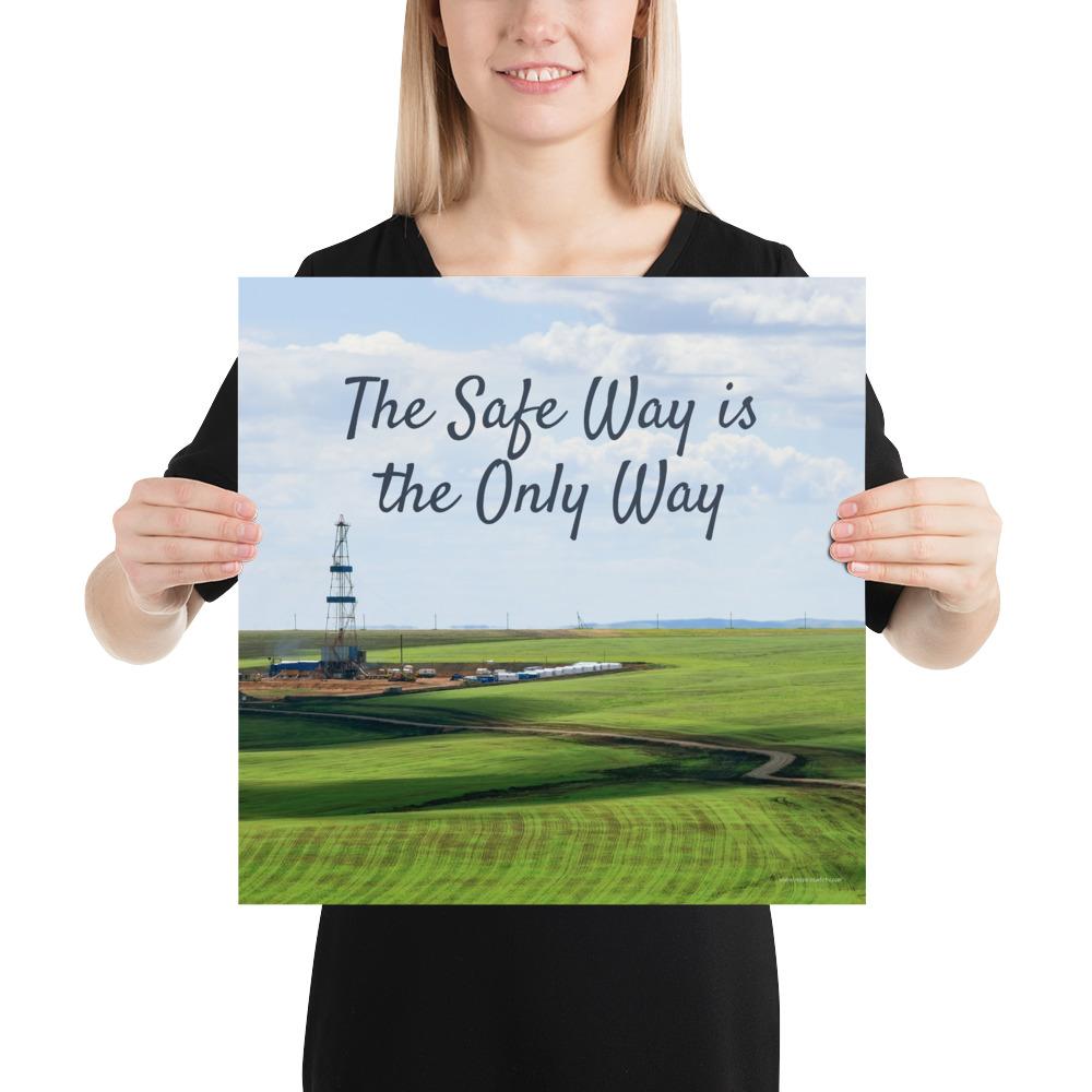 A safety poster showing an oil rig in a beautiful landscape scene of a field with vivid green grass and a bright blue sky with the slogan the safe way is the only way.