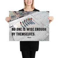 A workplace safety poster showing an aerial view of construction workers in reflective vests standing in a line on top of a building with their shadows being cast on the building with the quote no one is wise enough by themselves by Plautus.