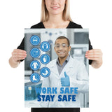 A workplace safety poster showing a scientist in a white lab coat, safety glasses, and blue latex gloves smiling and flashing a thumbs up with different blue infographic bubbles of PPE and the slogan work safe, stay safe.
