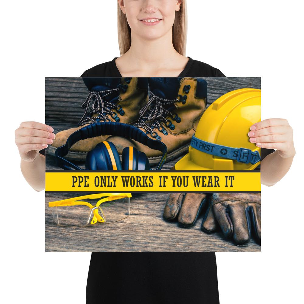 A safety poster showing a close-up of various PPE including safety glasses, ear muffs, gloves, a hard hat, and work boots with the slogan PPE only works if you wear it.