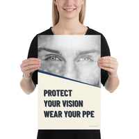 An eye safety poster of a black and white close up of a man's eyes looking intently forward with a safety slogan in blue text below.