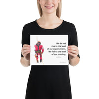 A safety poster showing a worker performing a controlled descent while wearing a fall protection harness on a bright white background with a quote from Archilochus to the right.
