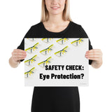 An eye safety poster depicting many clear safety glasses with yellow trim neatly lined up in rows and rows with a safety slogan in the foreground.