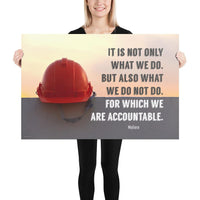 Safety poster showing a bright red hard hat sitting on concrete with sunny sky in background and a safety quote written in bold letters.