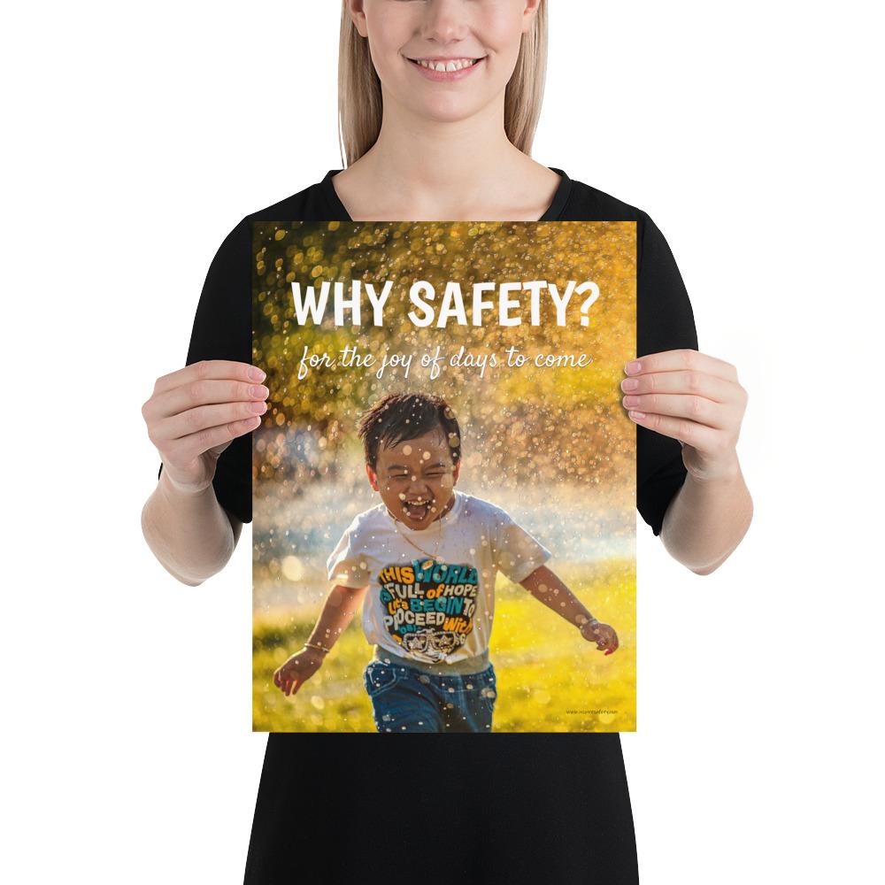 A workplace safety poster showing a young child running through a sprinkler with a huge smile on his face with the slogan why safety? for the joy of days to come.