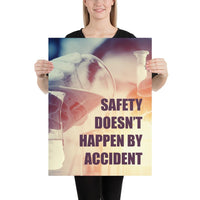 Safety poster showing a close up of 3 hands wearing gloves holding glass beakers and a safety slogan written in bottom right corner.