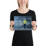 A safety poster showing a worker in a reflective jacket and hard hat walking through a warehouse with the quote keep thy shop and thy shop will keep you by Benjamin Franklin.