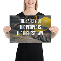 A safety poster showing a close-up of various PPE including safety glasses, ear muffs, gloves, a hard hat, and work boots with the quote by Cicero in the foreground.