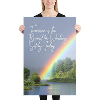 A workplace safety poster showing bright forest scene with a lake and vibrant green trees and a colorful rainbow coming out of the forest with the slogan tomorrow is the reward for working safely today.